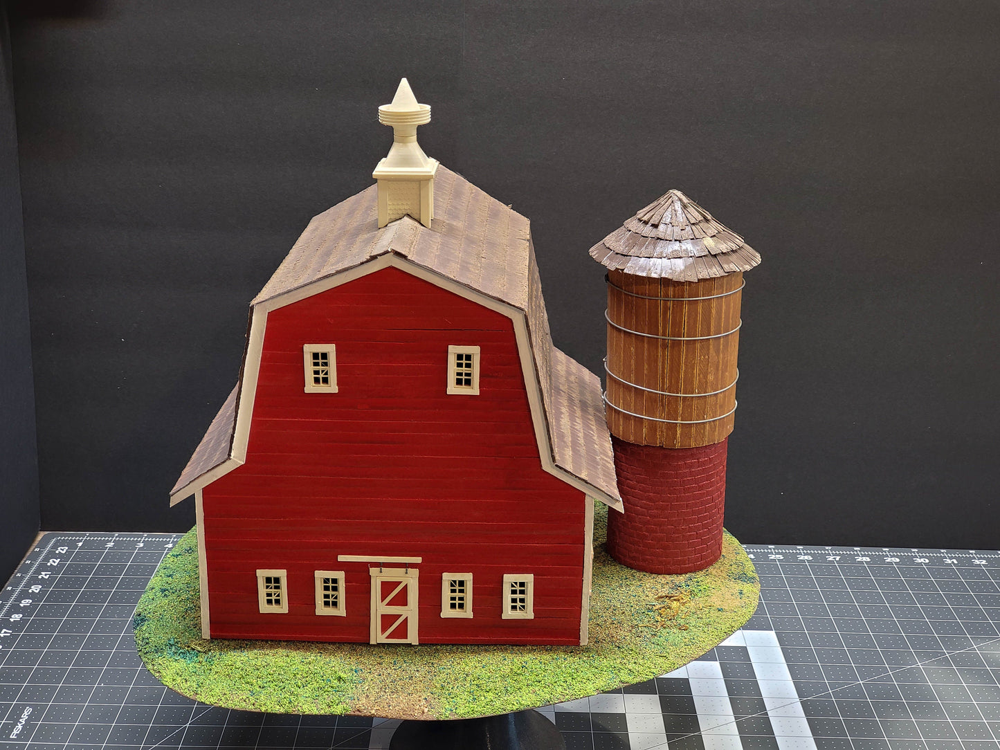 O-scale Red Barn made from real wood, a realistic silo, and a cornfield landscape. Ready-Built to install on your Model train layout.