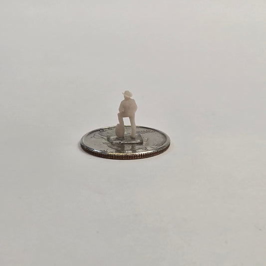 N Scale Cowboy – Foot on Barrel | Unpainted Western Miniature for Dioramas & Train Scenes