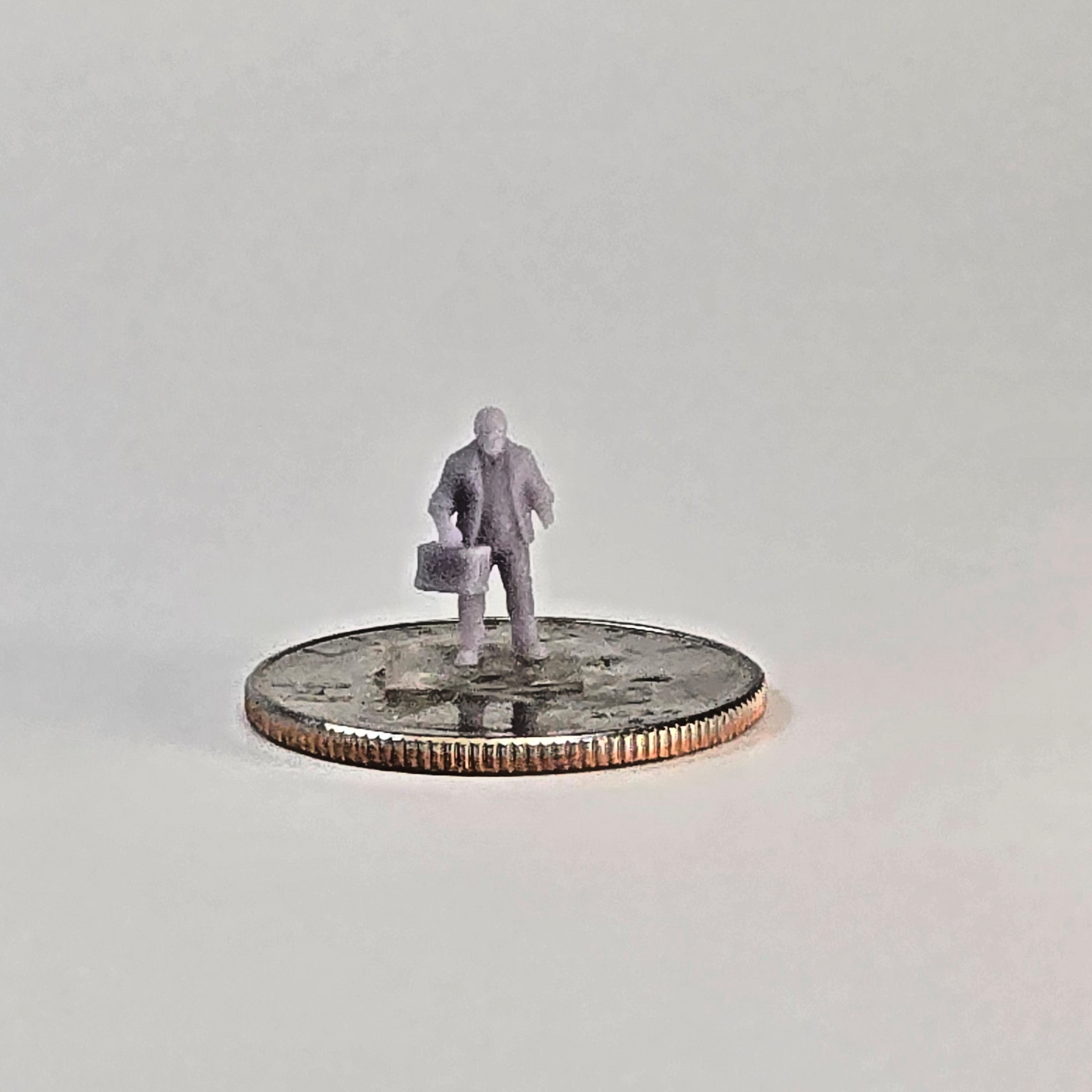 N Scale Dock Worker Miniature – Unpainted Resin Figure with Bag for Train Layout