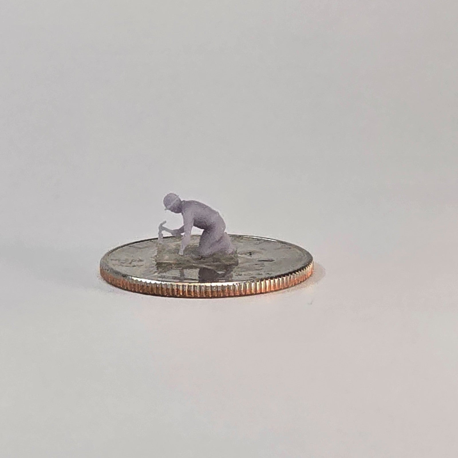 N Scale Carpenter Miniature – Kneeling Worker with Hammer | Unpainted Resin Figu