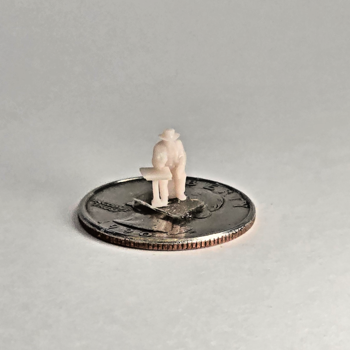 N Scale 12mm Gambler at Table – Unpainted Seated Figure for Western Dioramas