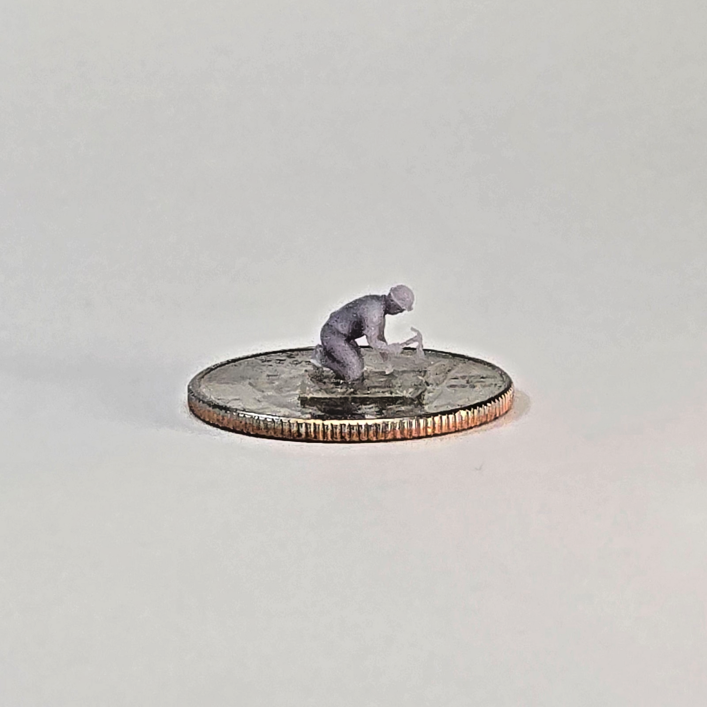 N Scale Carpenter Miniature – Kneeling Worker with Hammer | Unpainted Resin Figu