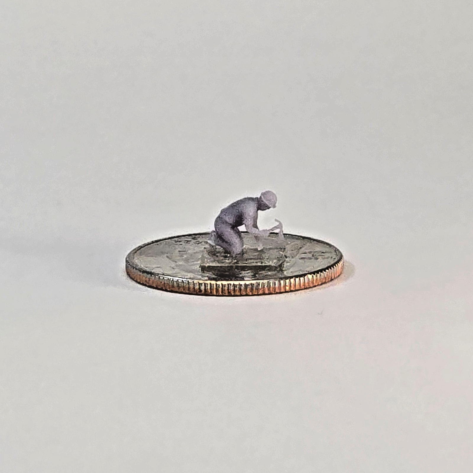 N Scale Carpenter Miniature – Kneeling Worker with Hammer | Unpainted Resin Figu