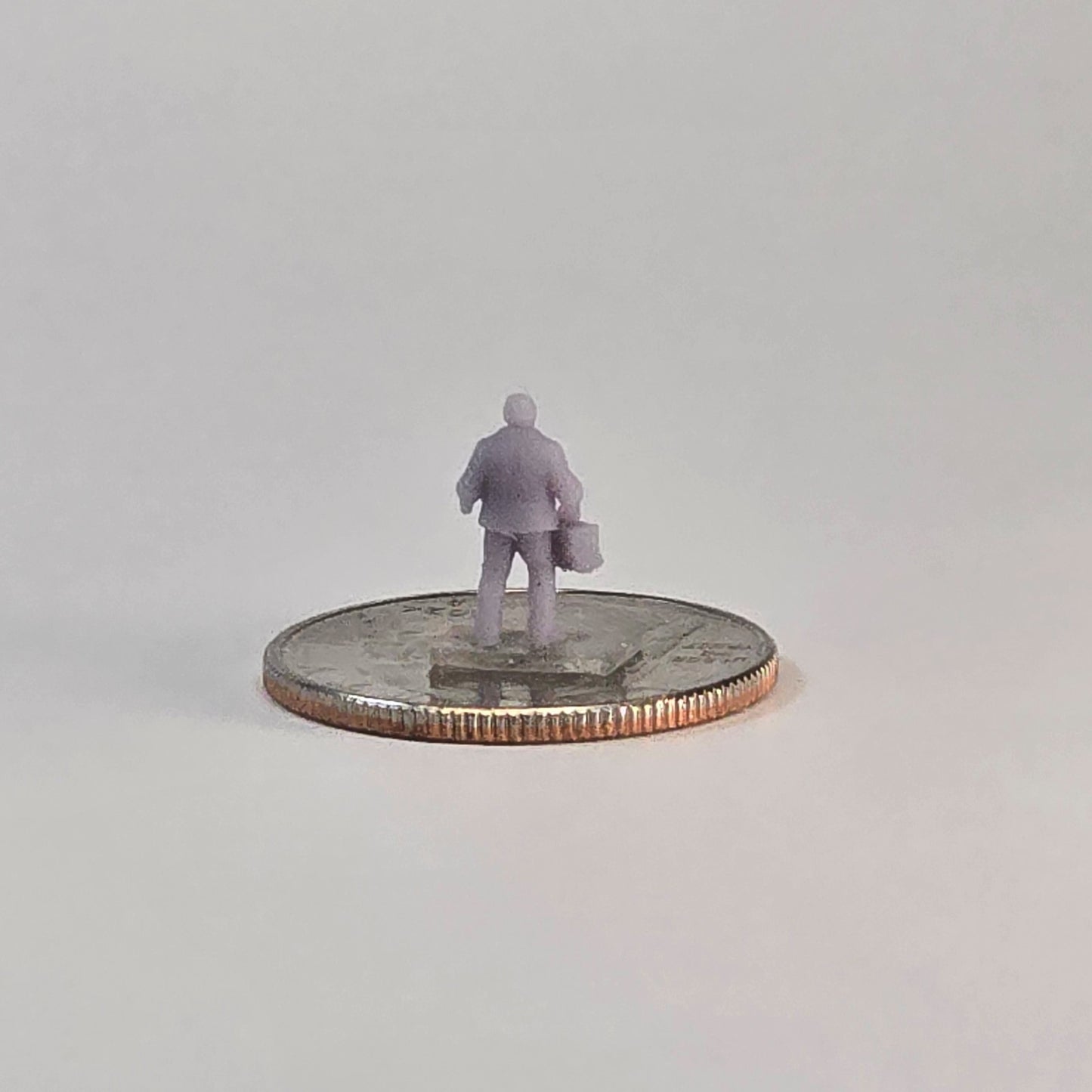 N Scale Dock Worker Miniature – Unpainted Resin Figure with Bag for Train Layout
