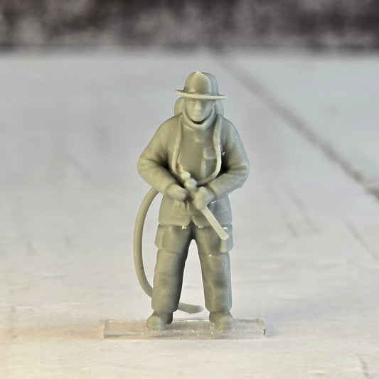 28mm scale Resin Printed Fireman with Hose – Diorama, doll houses, scale modelers, camera props, scene building