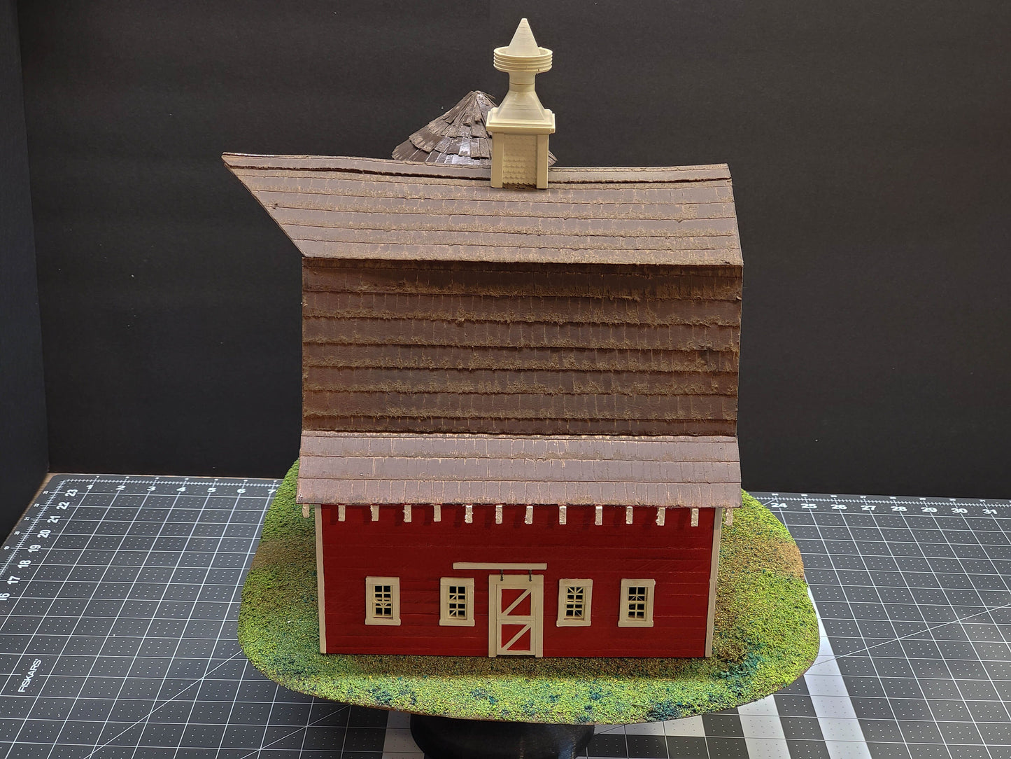 O-scale Red Barn made from real wood, a realistic silo, and a cornfield landscape. Ready-Built to install on your Model train layout.
