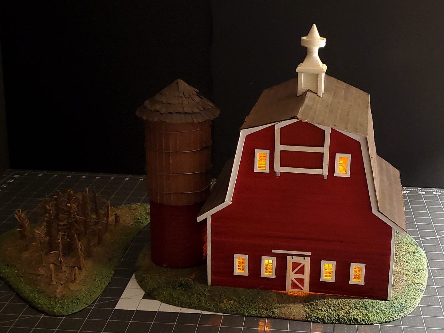 O-scale Red Barn made from real wood, a realistic silo, and a cornfield landscape. Ready-Built to install on your Model train layout.